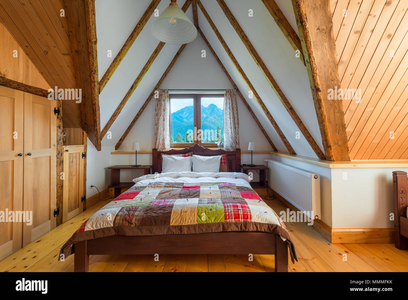 Bedroom Interior In A Wooden House With A Beautiful View From The Window To The Mountains Stock Photo Alamy