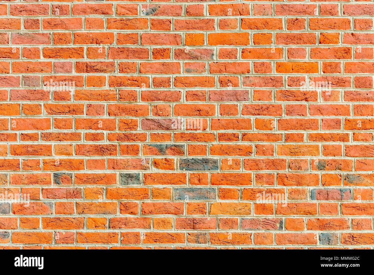 close up background red brick wall construction Stock Photo - Alamy
