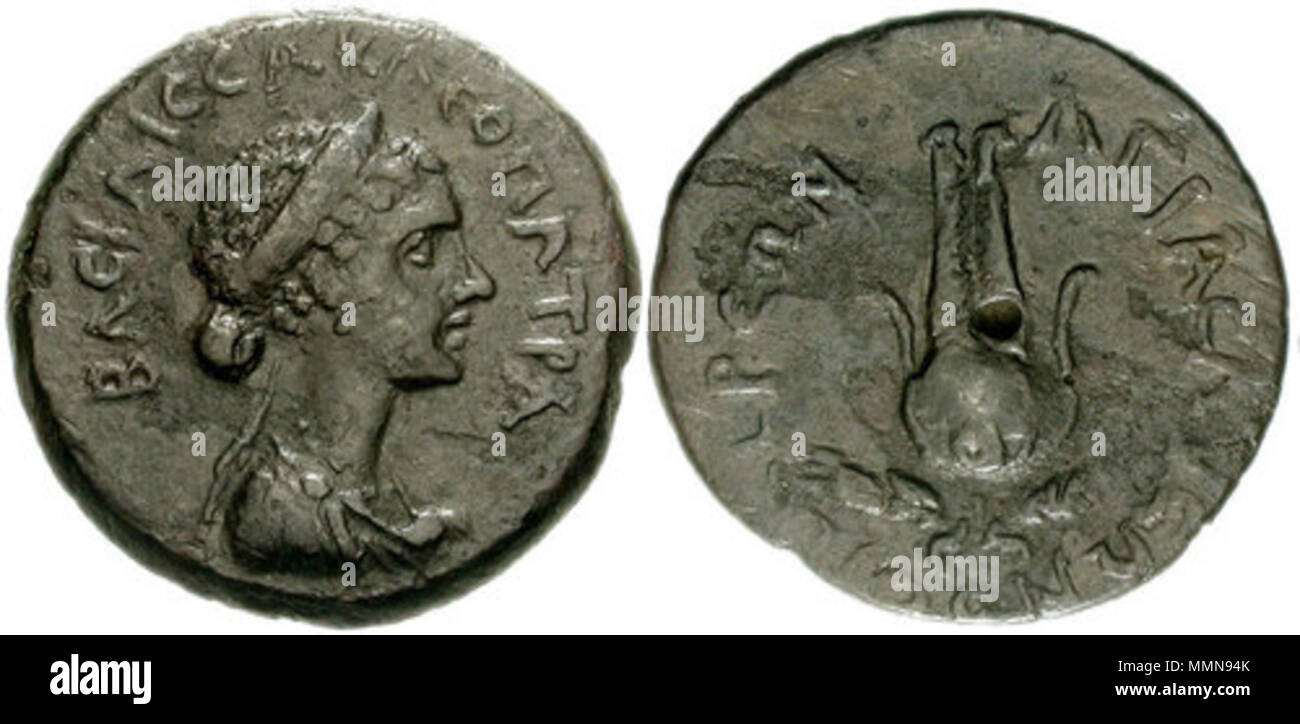 . English: Cleopatra VII. 51-30 BC. Æ Hemiobol of Patra – Hexachalkon (21mm, 5.01 g). Agias, son of Lyson, magistrate. Struck circa 32/1 BC. Inscription ΒΑΣΙΛΙΣΣΑ ΚΛΕΟΠΑΤΡΑ (Queen Cleopatra), diademed and draped bust right / Crown of Isis.  . 13 October 2013, 00:03:22. CNG, (uploaded by Odysses) 0010-Cleopatra-03 Stock Photo