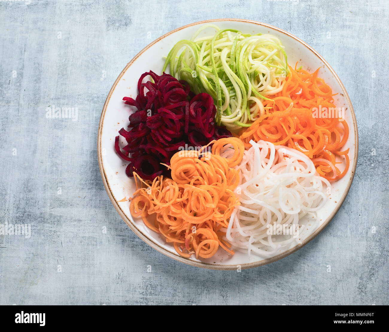 Vegetable noodles. Fresh zucchini, carrot, white radish, sweet potato