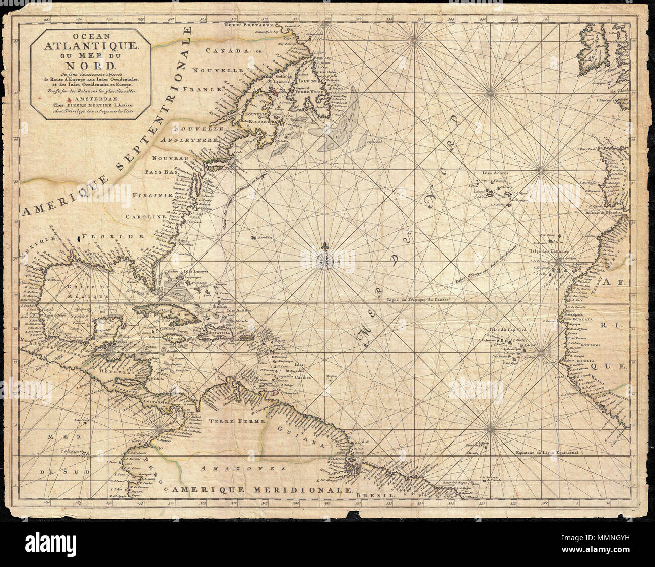 .  English: This is a rare and remarkable 1693 nautical chart of the Atlantic Ocean by Pierre Mortier. Covers the North Atlantic from rough 5 degree south latitude to roughly 56 degrees north latitude. Includes much of North America, all of the West Indies and Caribbean, Central America, the northern parts of South America, Western Africa, Ireland, and parts of Western Spain. As a whole Mortier's map presents a moderately accurate picture of the Americas. The coast lines, particularly in North America are a unnaturally craggy. Florida takes on an inverted cone aspect. The barrier islands and c Stock Photo