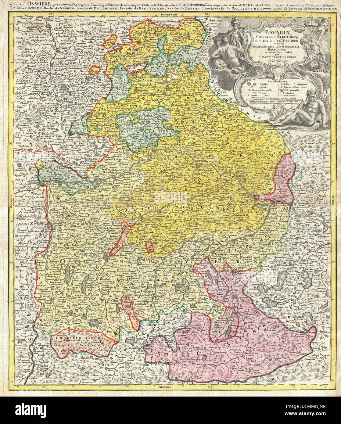 .  English: This is a rare and attractive map of Bavaria, Germany. Covers from Rabiz as far south as Innsbruck, including Munich, Salzburg, Passau, Bamberg, Nuremberg and Augsburg. Detail includes cities, forts, some topographical features, and districts. Stunning decorative title cartouche in the upper right quadrant featuring soldiers, cherubs, greed gods, and armorial decorations. Additional title, in French, in upper margin La cercle de Baviere, qui comprend la regence d'Amberg … Prepared by J.B. Homann and issued as plate no. 10 in Homann Heirs’ Maior Atlas Scholasticus. Deutsch: Karte vo Stock Photo