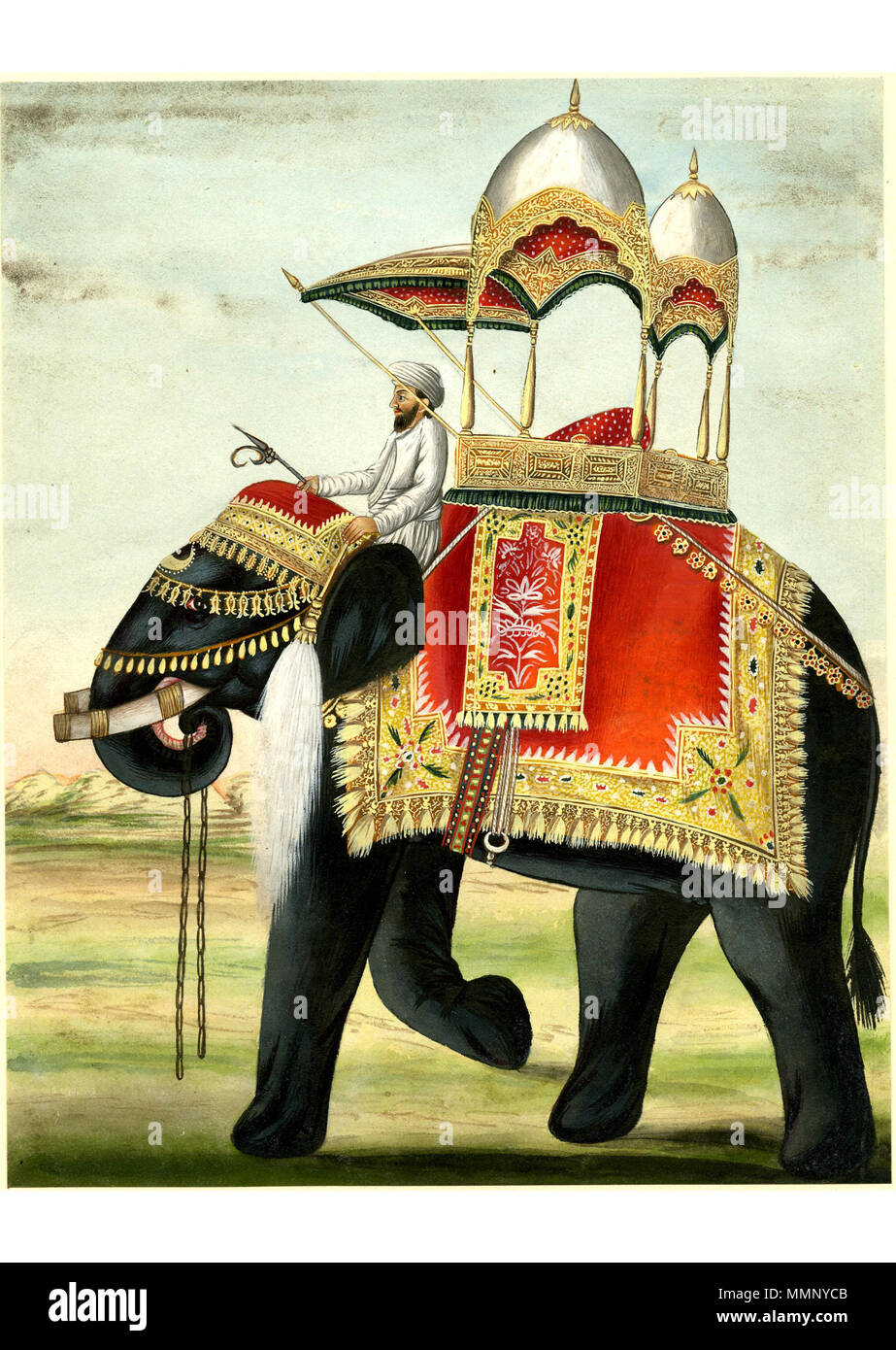 . English: Painting on paper of a decorated elephant with a howdah on its back. The elephant is adorned with a decorated saddle blanket and headdress. On its neck sits a mahout (driver), who holds an ankusha (elephant goad) and an elegant chauri (fly whisk). The howdah is lavishly decorated with textiles and tassels. The roof consists of two silver domes decorated with gold. The elephant is shown walking on a grassy terrain with hills in the distance.  . 19thC(early). Company School 20 A decorated elephant with a howdah on its back Stock Photo