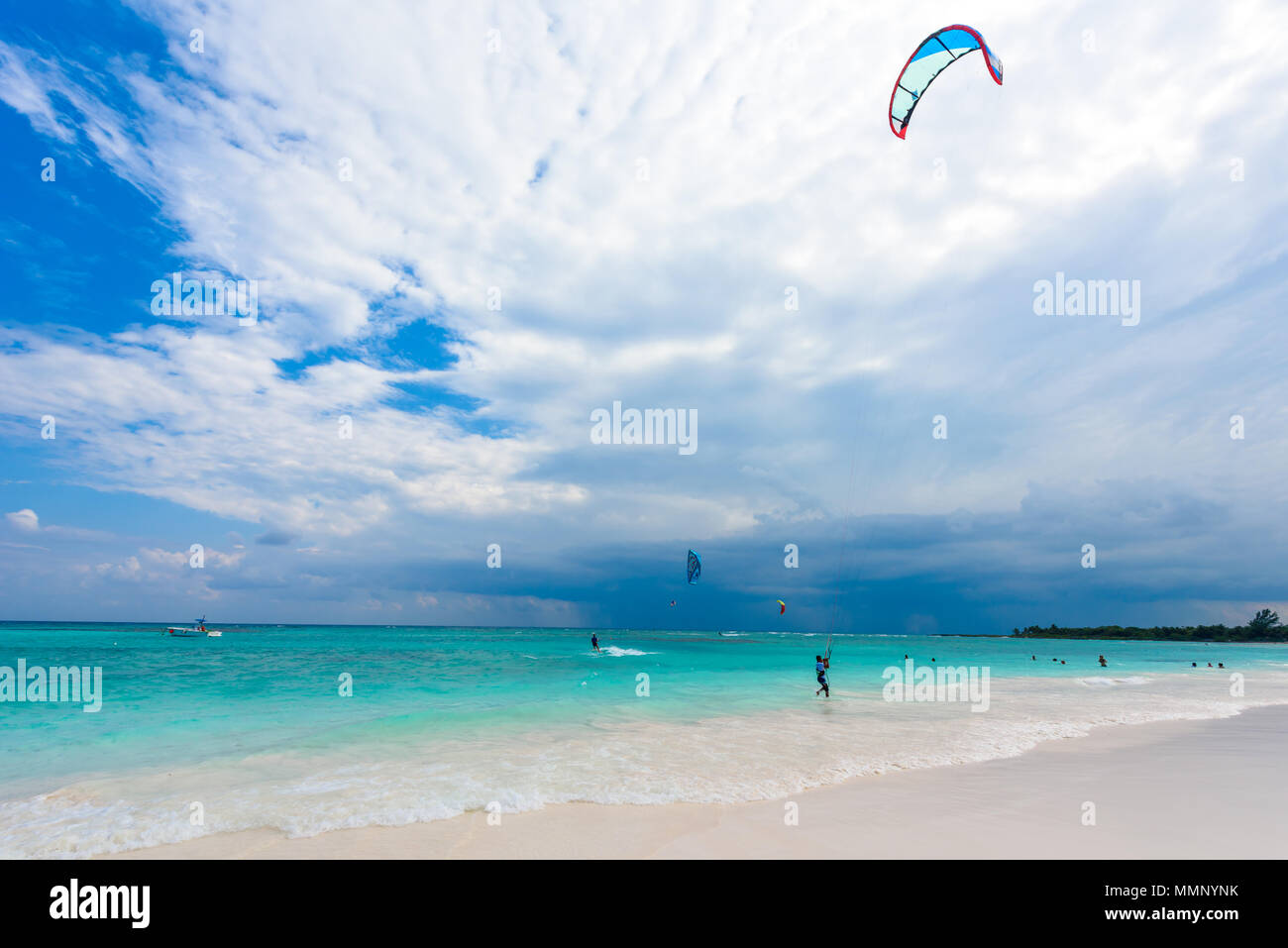 Kite surfing at paradise beach Stock Photo