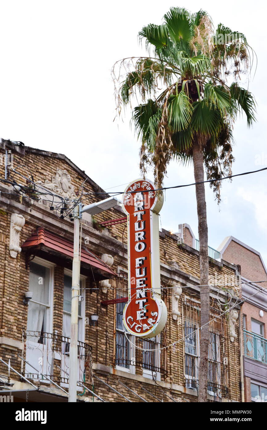 Downtown Ybor City in Tampa's oldest, historical neighborhood.  Building restored, original artwork and retro stores of art, cigars, hookahs and food. Stock Photo