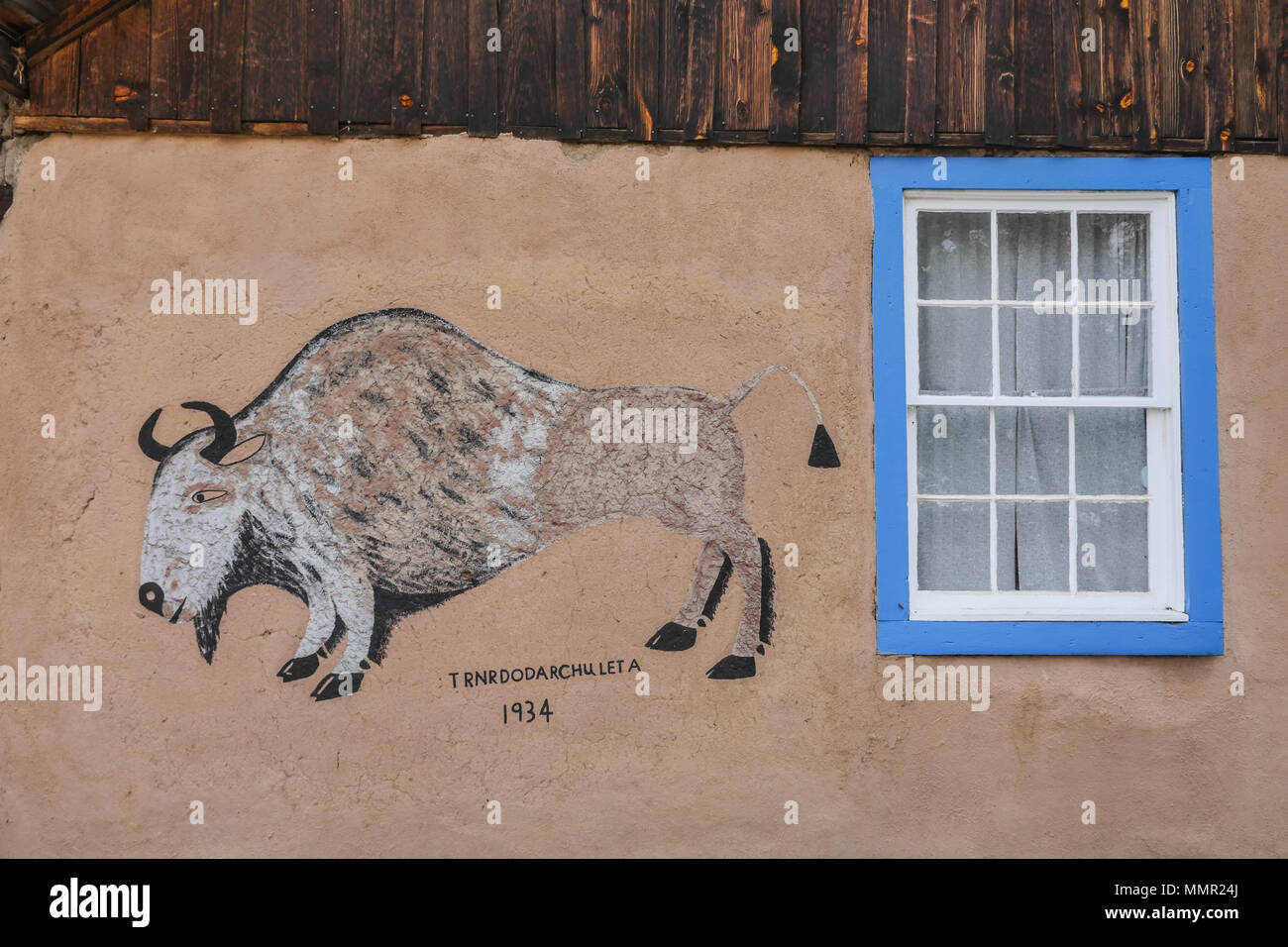 Painting on the side of the cabin where D. H. Lawrence lived for a time in the 1920s, near Taos, New Mexico. This also was a favorite getaway of Georg Stock Photo