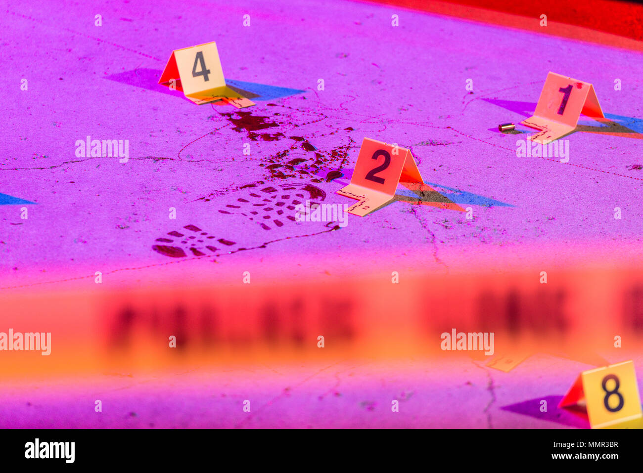 https://c8.alamy.com/comp/MMR3BR/a-bloody-footprint-is-marked-with-an-evidence-marker-within-a-crime-scene-MMR3BR.jpg