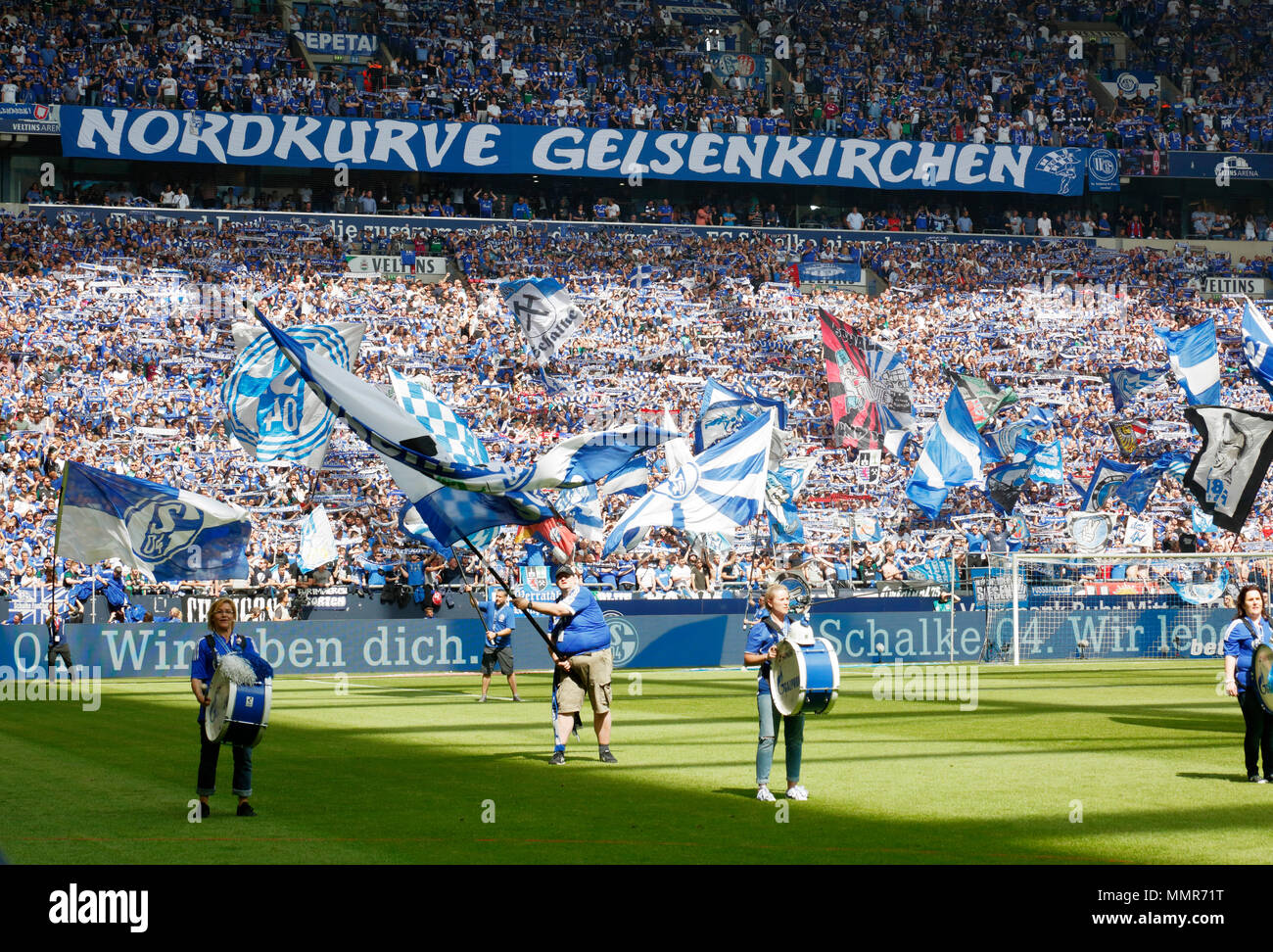 sports, football, Bundesliga, 2017/2018, FC Schalke 04 vs Eintracht Frankfurt 1:0, Veltins Arena Gelsenkirchen, fun and enthusiasm at the football fans, flag waving, flag bearers Stock Photo