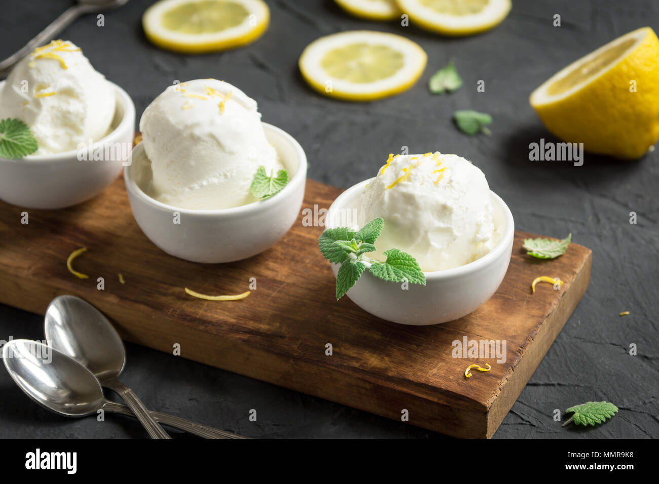 https://c8.alamy.com/comp/MMR9K8/lemon-ice-cream-in-bowl-homemade-citrus-lemon-ice-cream-gelato-with-mint-close-up-MMR9K8.jpg