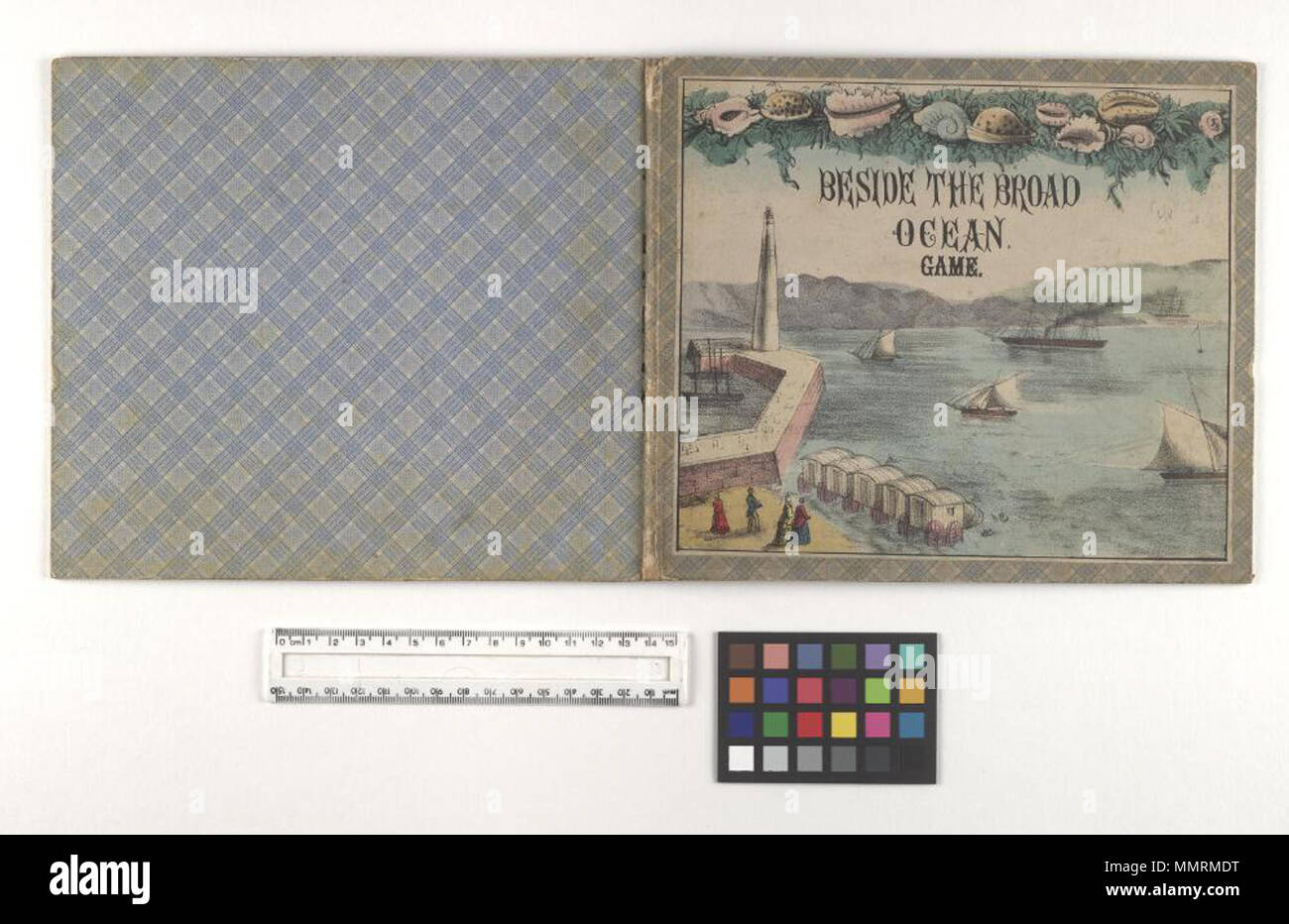 Board games; Seaside resorts; Beaches; Bathhouses; Sailboats; People;  Jetties; Cliffs; Forts and fortifications; Fishing nets; Telescopes;  Shells; Punch and Judy; sand castles; Game entitled Beside the broad ocean;  folded sheet within