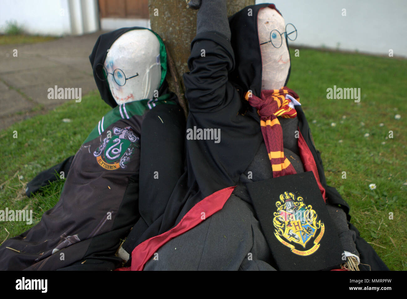 Glasgow, Scotland, UK 12th May.UK Weather: Carmunnock Gala Day  was highlighted by its topical scarecrow competition as sunshine made the day a hot one, Harry potter and friend looked like they had been lert to starve tied to  trees in the village centre.  Gerard Ferry/Alamy news Credit: gerard ferry/Alamy Live News Stock Photo