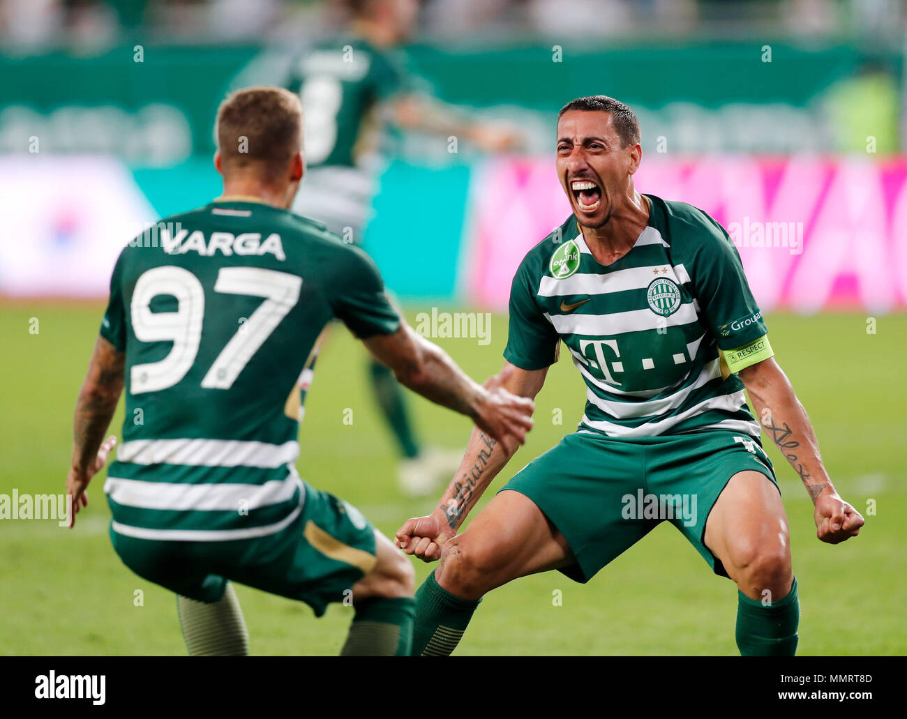 BUDAPEST, HUNGARY - MAY 12: (r-l) Leandro De Almeida 'Leo' of Ferencvarosi  TC celebrates the goal with Roland Varga of Ferencvarosi TC during the  Hungarian OTP Bank Liga match between Ferencvarosi TC