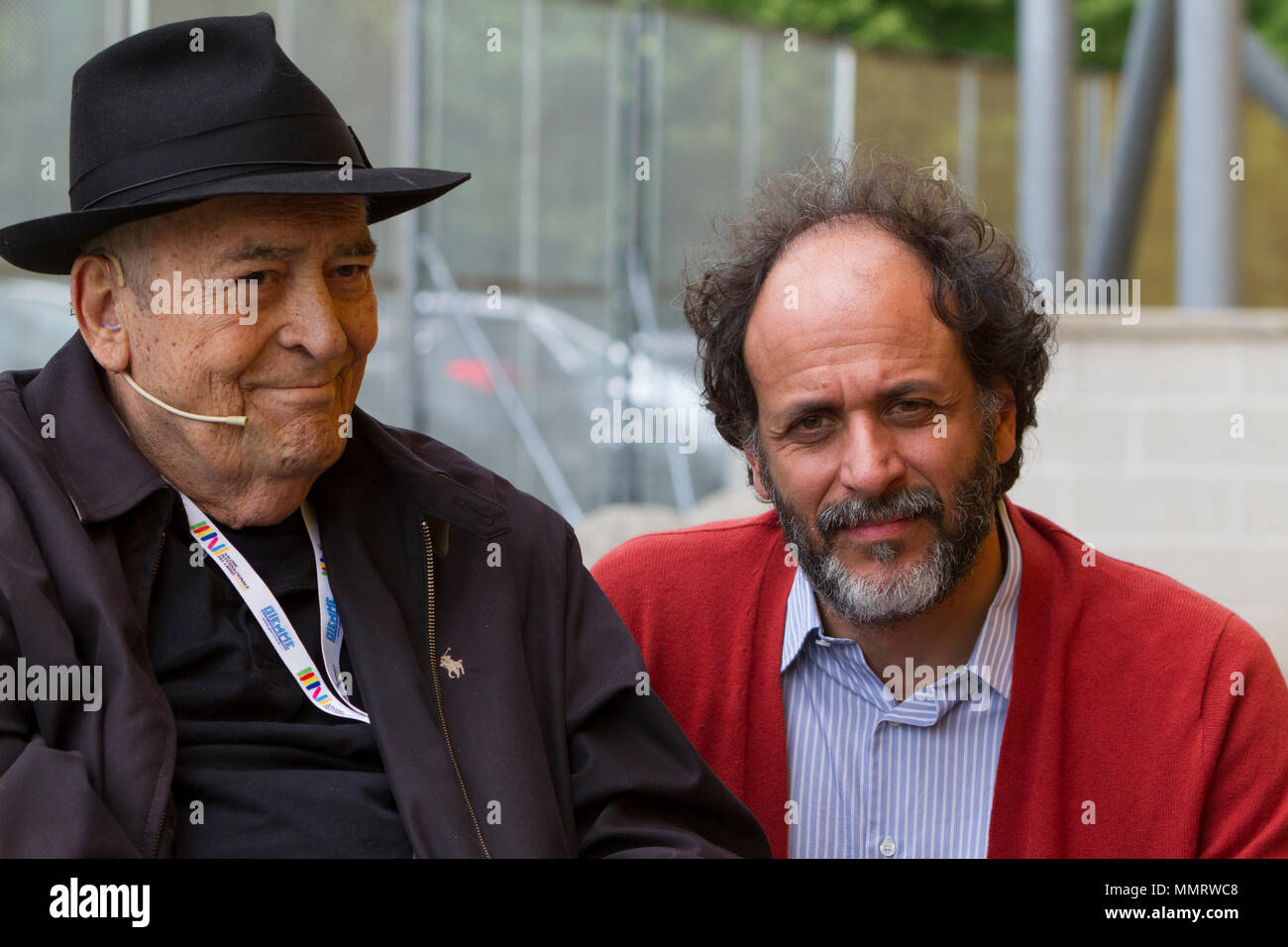 Torino, Italy. 12th May 2018. Italian film directors Bernardo Bertolucci (left) and Luca Guadagnino (right) are guests of 2018 Torino Book Fair. Stock Photo