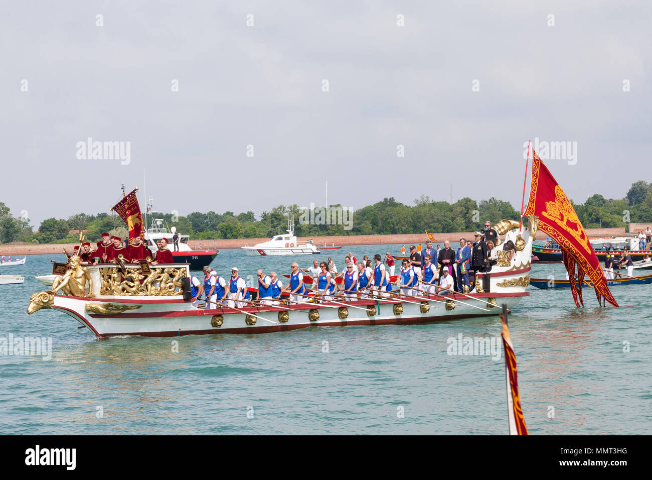 Venice, Veneto, Italy.  13th May 2018.  The Serenissama ceremonial boat with the dignatories Mayor Brugnaro, The Head of the Navy  and Patriarch of Venice,  at Lido during the Festa de la Sensa for the blessing of the gold ring which is then tossed into the lagoon marrying Venice to the sea. Credit Mary Clarke/Alamy Live News Stock Photo
