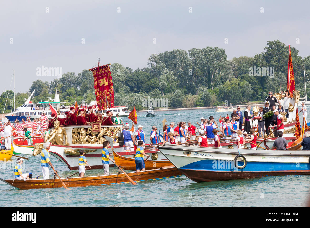 Venice, Veneto, Italy.  13th May 2018.  The cortege or corteo  of rowers in the boats accompanying the Serenissama ceremonial boat during Festa de la Sensa with the dignatories Mayor Brugnaro, the Head of the Navy and Patriarch of Venice,  at Lido during the ceremony for the blessing of the gold ring by the Patriach  which is then tossed into the lagoon marrying Venice to the sea. Credit Mary Clarke/Alamy Live News Stock Photo