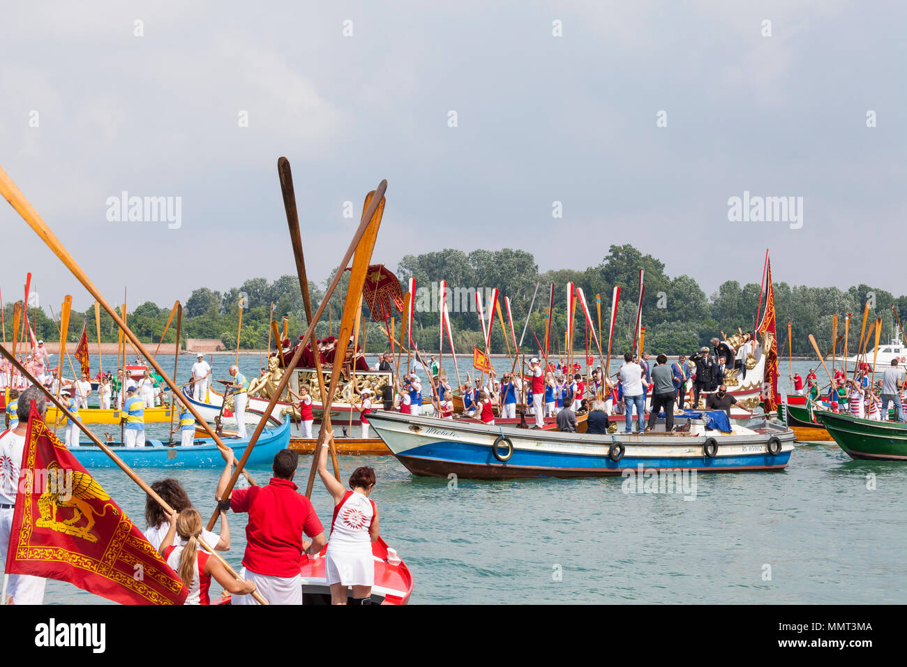 Venice, Veneto, Italy.  13th May 2018.  The cortege or corteo  of rowers in the boats accompanying the Serenissama ceremonial boat during Festa de la Sensa with the dignitaries Mayor Brugnaro, the head of the Navy and Patriarch of Venice,  at Lido during the ceremony for the blessing of the gold ring by the Patriach  which is then tossed into the lagoon marrying Venice to the sea. Credit Mary Clarke/Alamy Live News Stock Photo