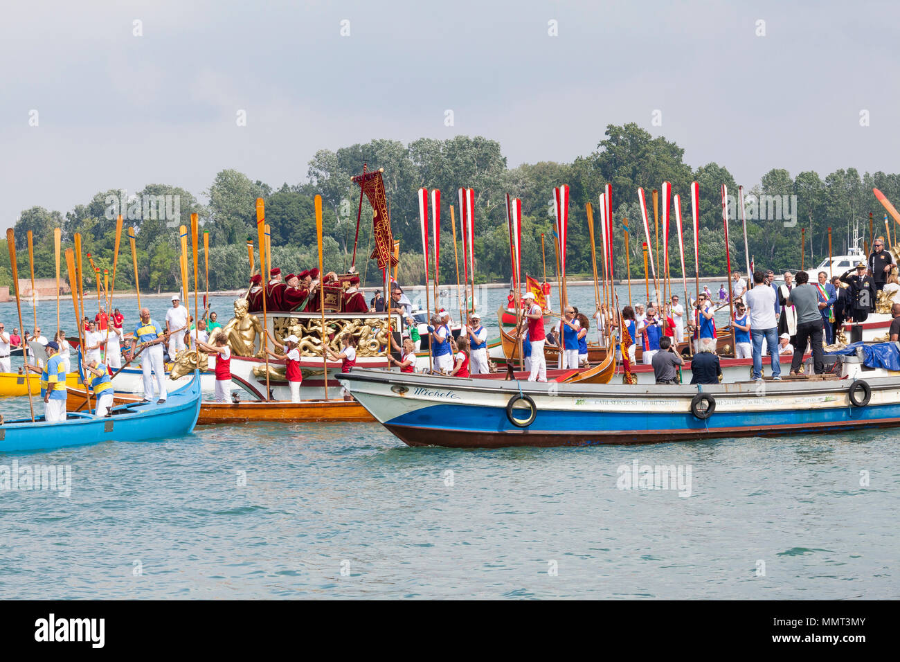 Venice, Veneto, Italy.  13th May 2018.  The cortege or corteo  of rowers in the boats accompanying the Serenissama ceremonial boat during Festa de la Sensa with the dignitaries Mayor Brugnaro, the head of the Navy  and Patriarch of Venice,  at Lido during the ceremony for the blessing of the gold ring by the Patriach  which is then tossed into the lagoon marrying Venice to the sea. Credit Mary Clarke/Alamy Live News Stock Photo