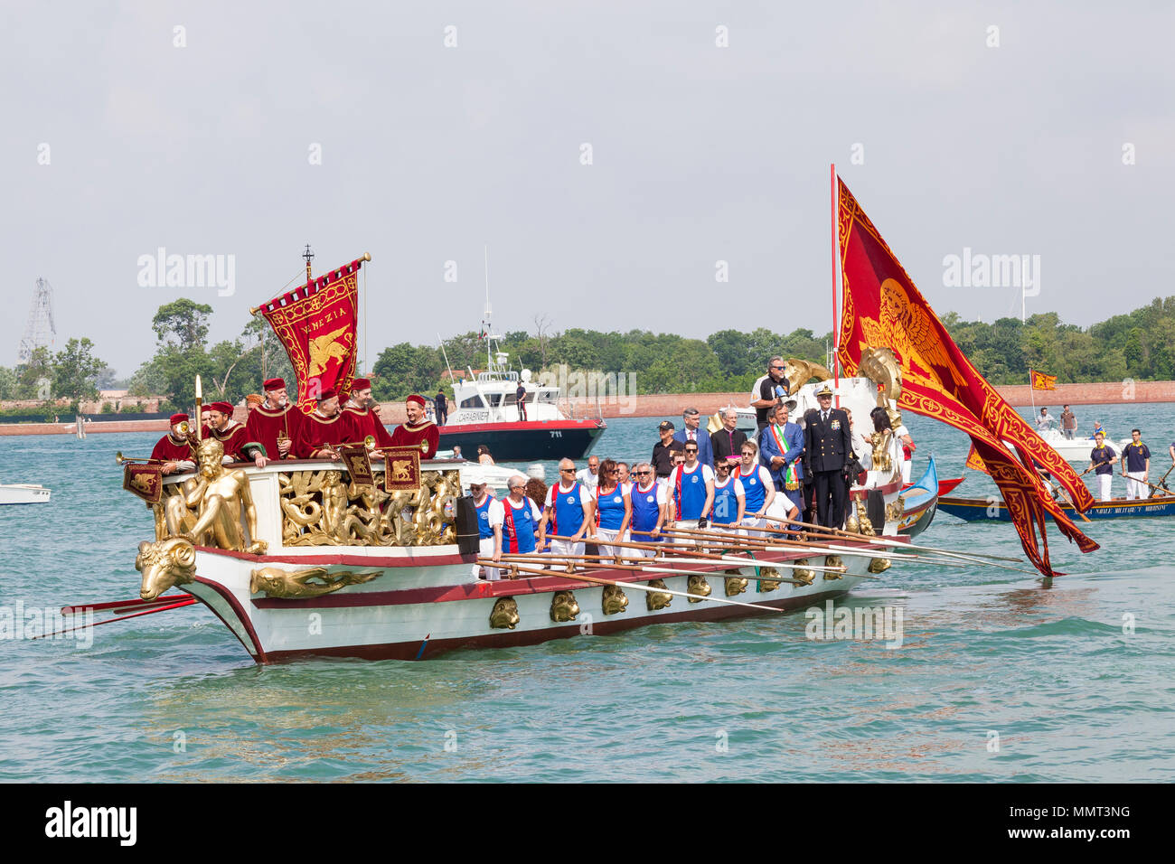 Venice, Veneto, Italy.  13th May 2018.  The Serenissama ceremonial boat during Festa de la Sensa with the dignatories Mayor Brugnaro, the head of the Navy and Patriarch of Venice,  at Lido during the ceremony for the blessing of the gold ring by the Patriarch  which is then tossed into the lagoon marrying Venice to the sea. Credit Mary Clarke/Alamy Live News Stock Photo
