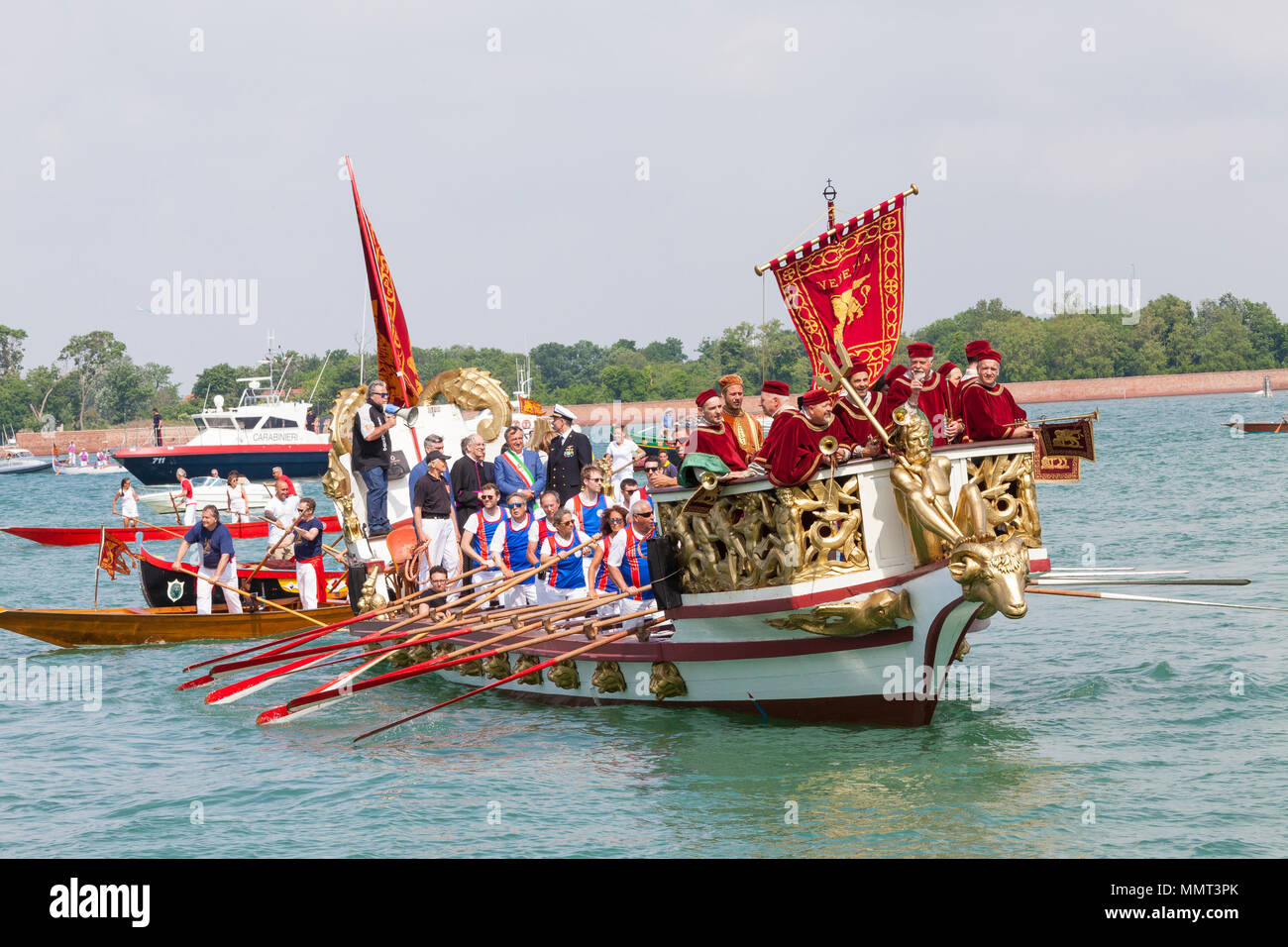 Venice, Veneto, Italy.  13th May 2018.  The Serenissama ceremonial boat during Festa de la Sensa with the dignatories Mayor Brugnaro, the Head of the Navyl and Patriarch of Venice,  at Lido during the ceremony for the blessing of the gold ring by the Patriach  which is then tossed into the lagoon marrying Venice to the sea. Credit Mary Clarke/Alamy Live News Stock Photo