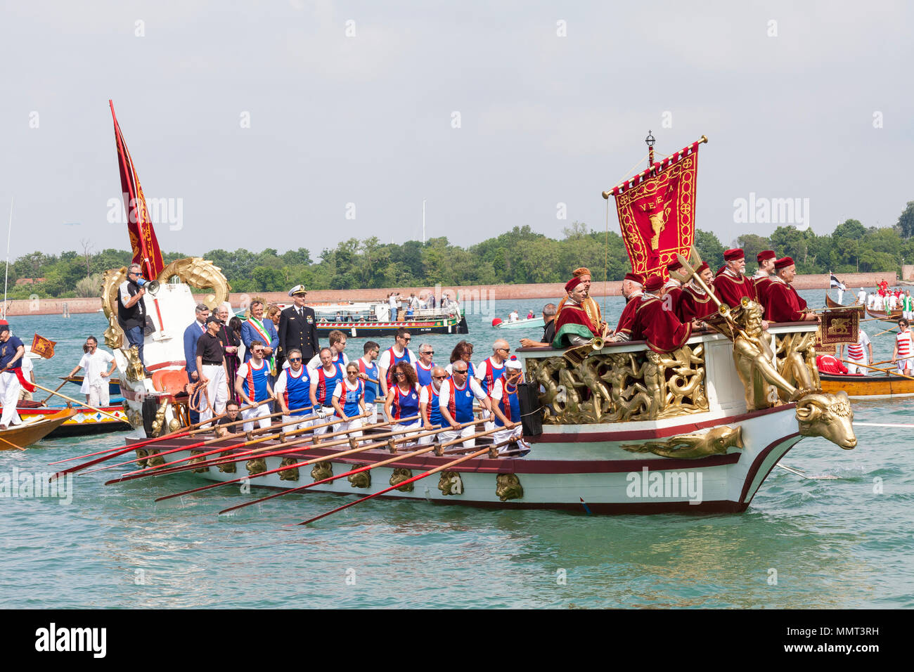 Venice, Veneto, Italy.  13th May 2018.  The Serenissama ceremonial boat during Festa de la Sensa with the dignatories Mayor Brugnaro, the Head of the Navyl and Patriarch of Venice,  at Lido during the ceremony for the blessing of the gold ring by the Patriach  which is then tossed into the lagoon marrying Venice to the sea. Credit Mary Clarke/Alamy Live News Stock Photo