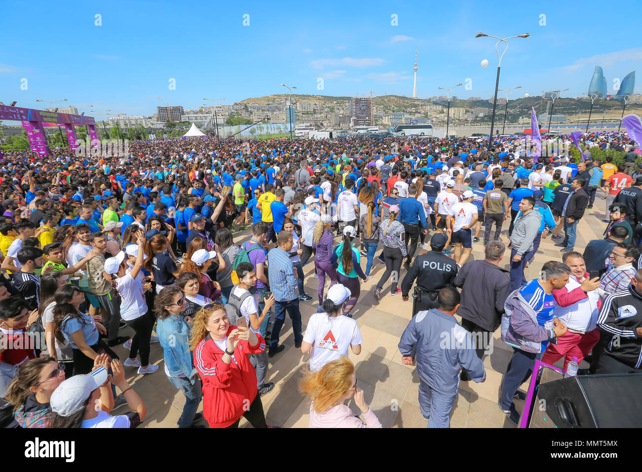 Baku, Azerbaijan. 13th May, 2018. Large group of marathon runners in Baku. May 13, 2018. The semi-marathon was cover a distance of 21 kilometers, starting at the national Flag Square and finishing at Baku Olympic Stadium. This year’s semi-marathon was open to anyone above the age of 16 upon prior registration, and the event got nearly 18,000 registered participants. Credit: Aziz Karimov/Alamy Live News Stock Photo