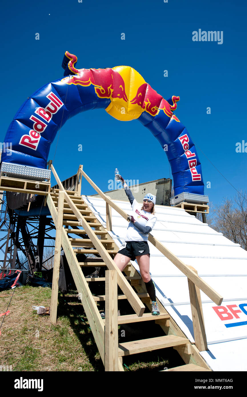 Ironwood, USA. 12th May, 2018. A contestant celebrates her finish at the Red  Bull 400 hill climb at Copper Peak, MI., on Saturday, May 12, 2018. Red Bull  describes as the toughest