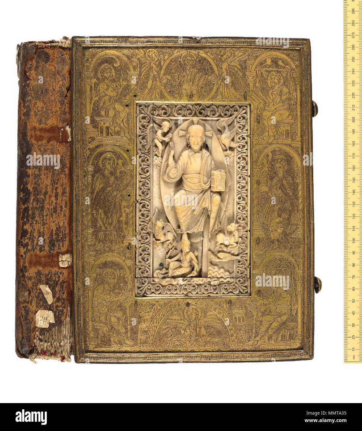 Ivory plaque set in engraved metal. Flemish and/or German, early to mid  11th century. The ivory, attributed to Liège in the early 11th century,  shows Christ in triumph over personifications of