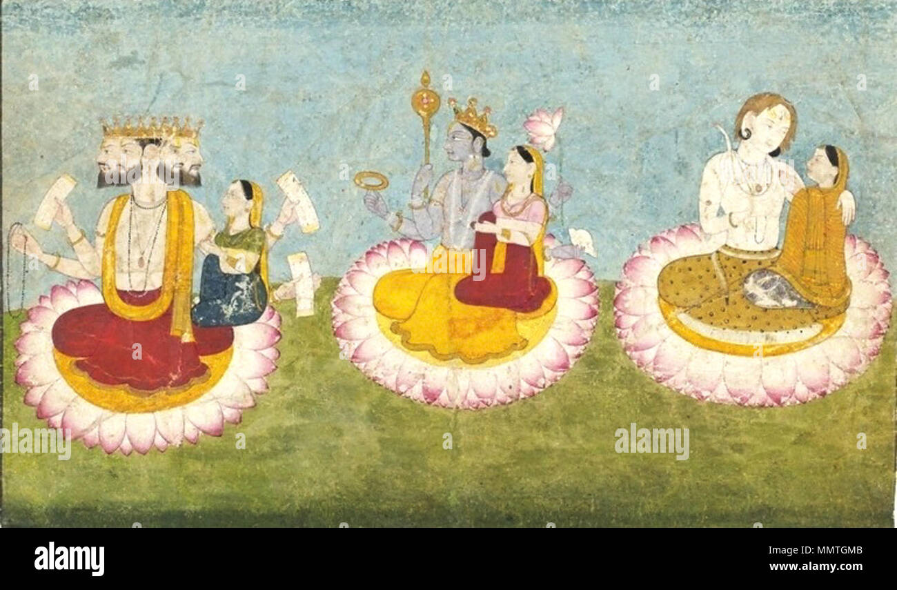 . English: Brahma, Vishnu and Shiva seated on lotuses with their consorts, Saraswati, Lakshmi and Paravati respectively. ca 1770. Guler, India. 'The three greatest Hindu deities are shown here together with their consorts. They are sometimes regarded as a trinity, who together represent aspects of the supreme godhead. The four-headed Brahma, holding copies of the oldest Indian sacred scriptures, the Vedas, together with his consort Saraswati, symbolises the power of creation. Next to him the blue Vishnu, with his consort Lakshmi, represents the energy that upholds and preserves creation. To th Stock Photo