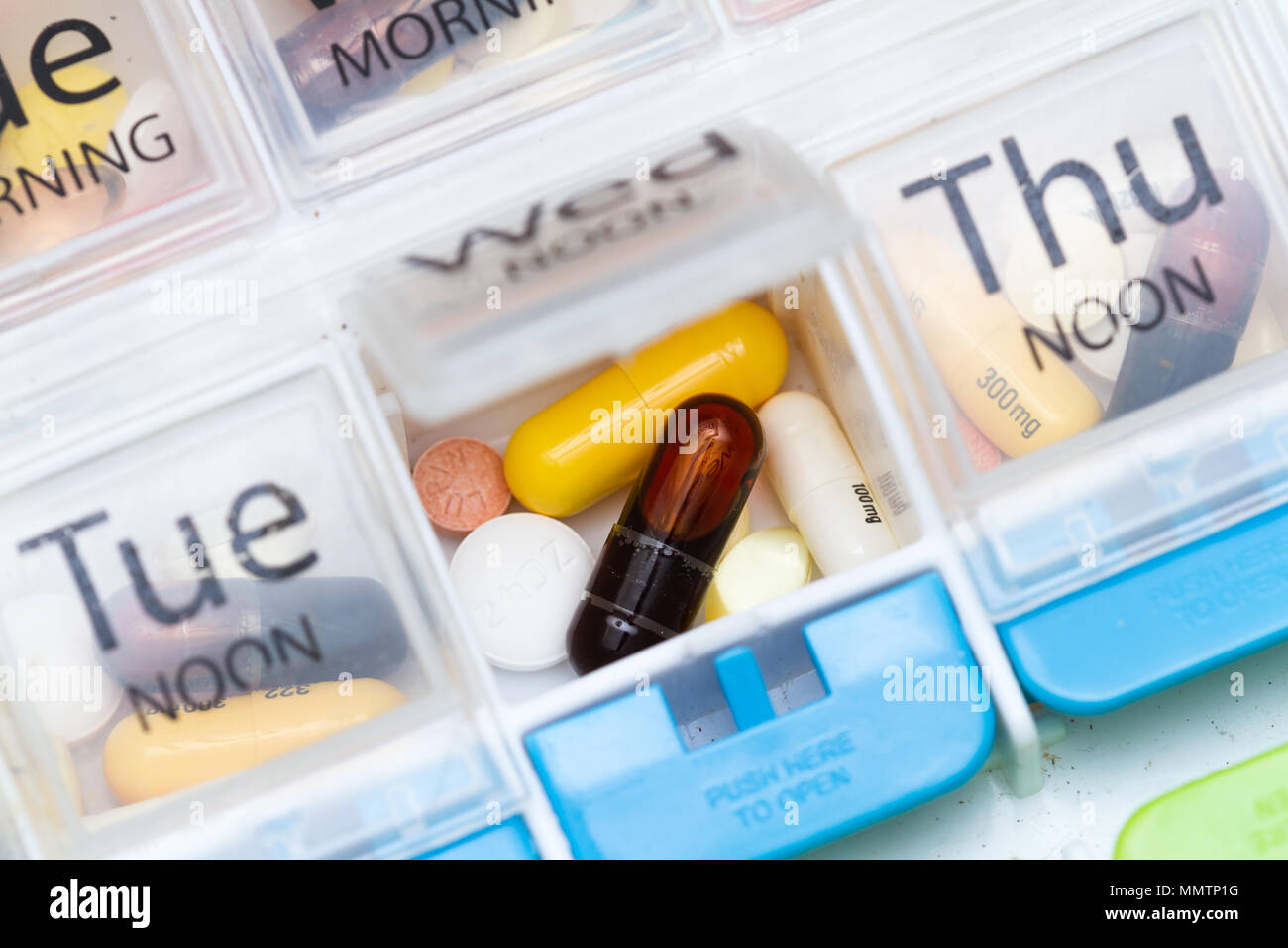close up of an organizer for a daily regime of prescriptions drugs Stock Photo