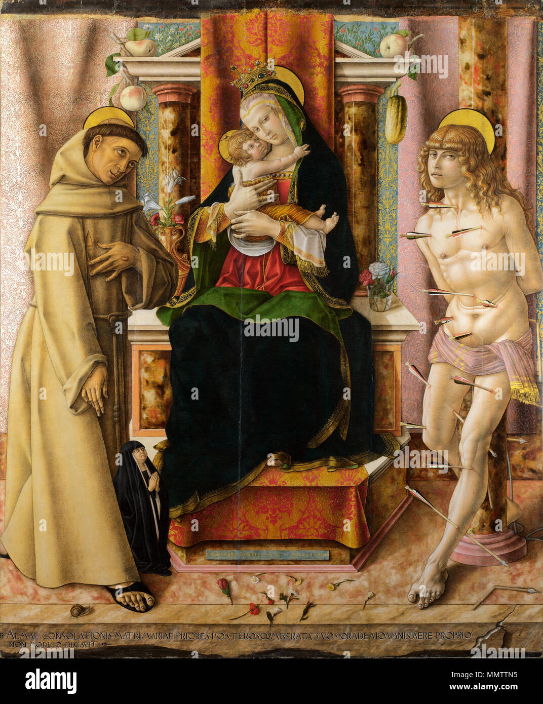 The Virgin and Child with Saints Francis and Sebastian. 1491. Carlo Crivelli - The Virgin and Child with Saints Francis and Sebastian Stock Photo