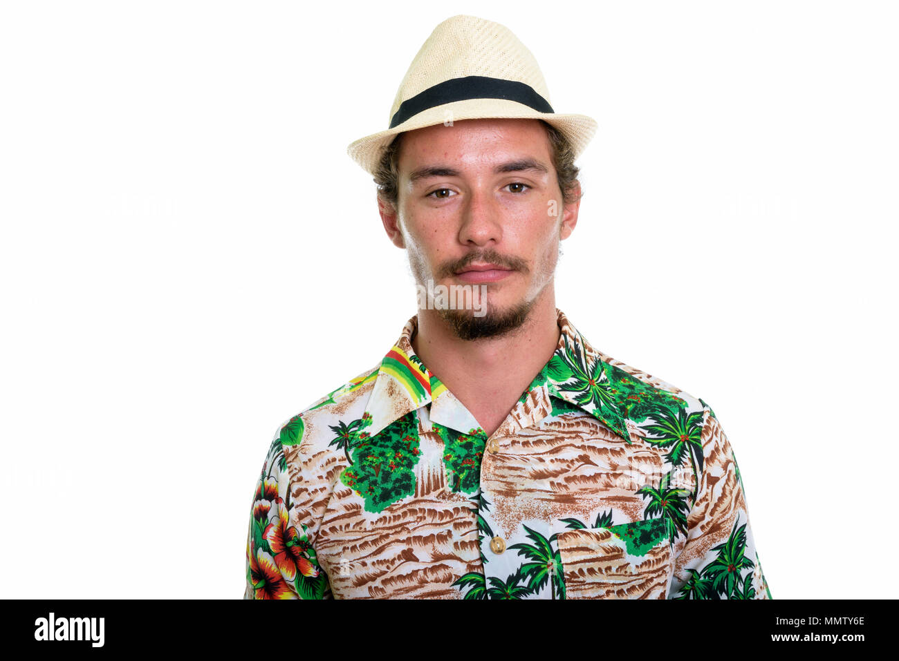 Close up of young handsome tourist man isolated against white ba Stock Photo