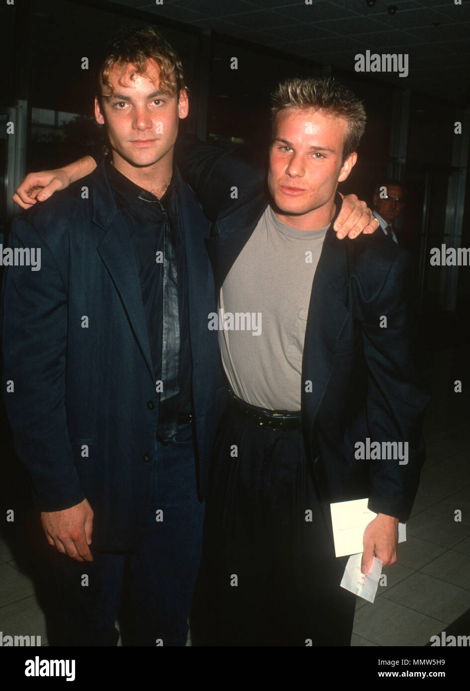 CENTURY CITY, CA - JUNE 14:  (L-R) Actors Eric DaRe and James Marshall attend ABC TV Affiliates Party at the Century Plaza Hotel on June 14, 1990 in Century City, California. Photo by Barry King/Alamy Stock Photon Stock Photo