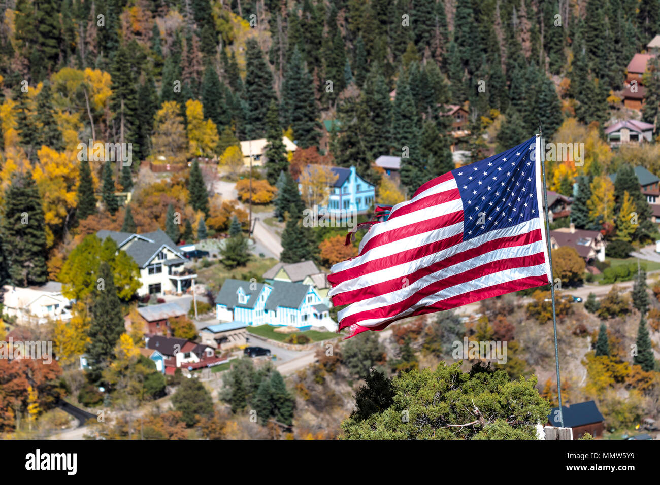OCTOBER 6, 2017 US Flag flies over small town Ouray, Colorado Stock