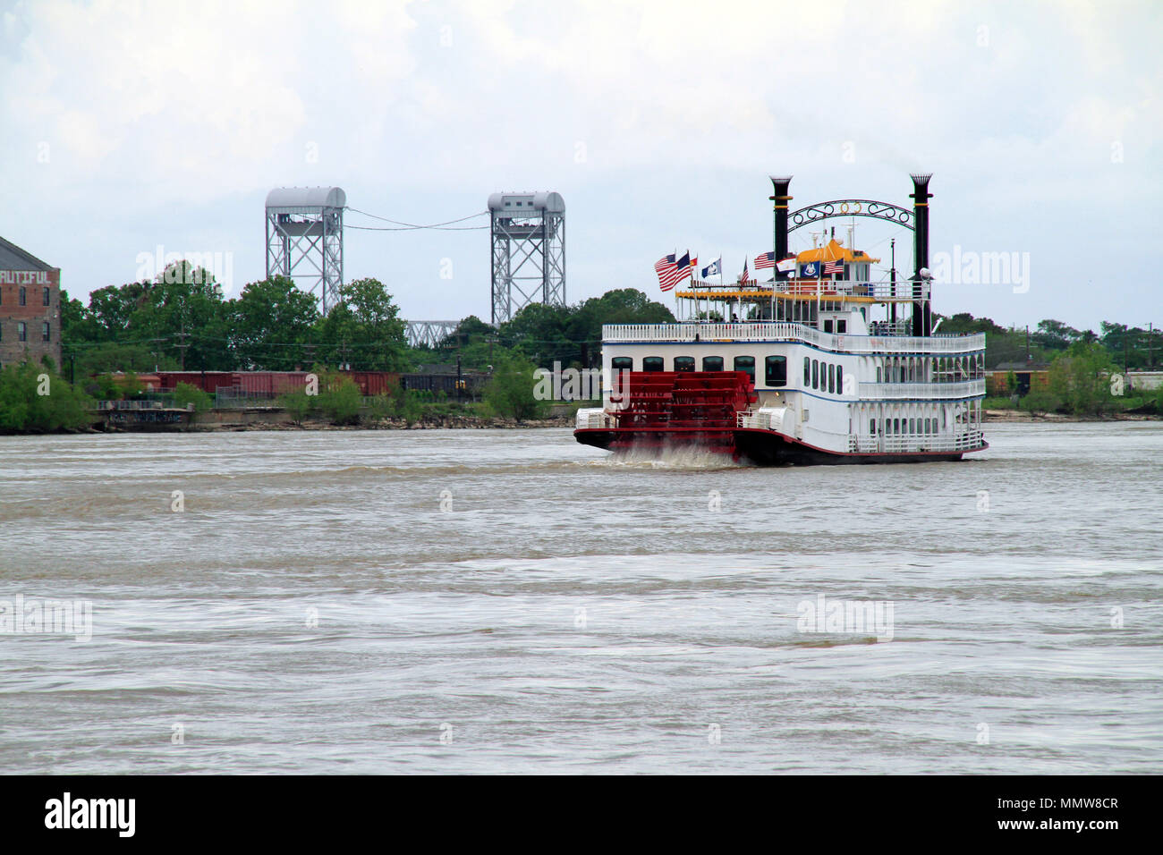New Orleans River steam boat going up Mississippi river Stock Photo