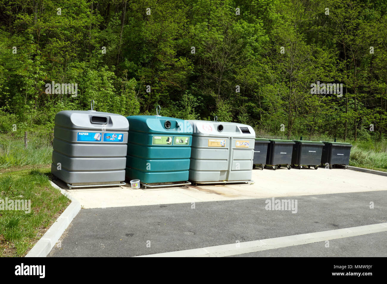 Large coloured recycling bins for glass paper and packaging Recycling