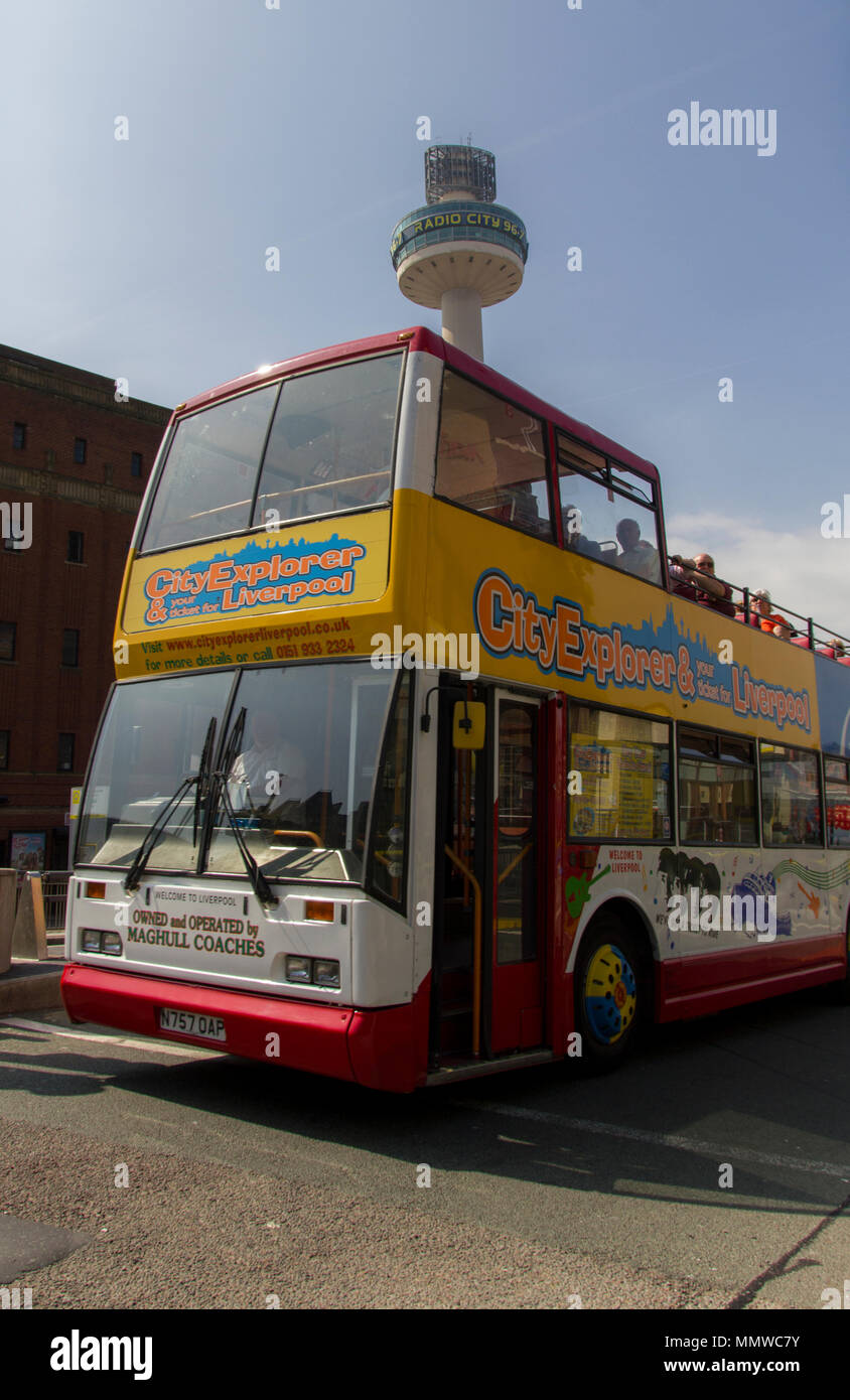 City Explorer tourist bus with Radio City tower in the background ...