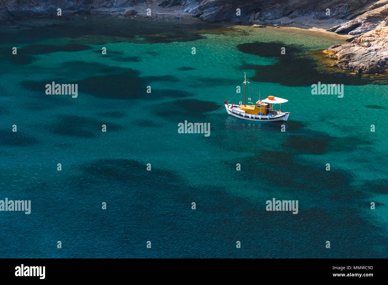 Traditional fishing boat at the beach near Agios Ioannis Thermastis village  on Fourni island in Greece Stock Photo - Alamy