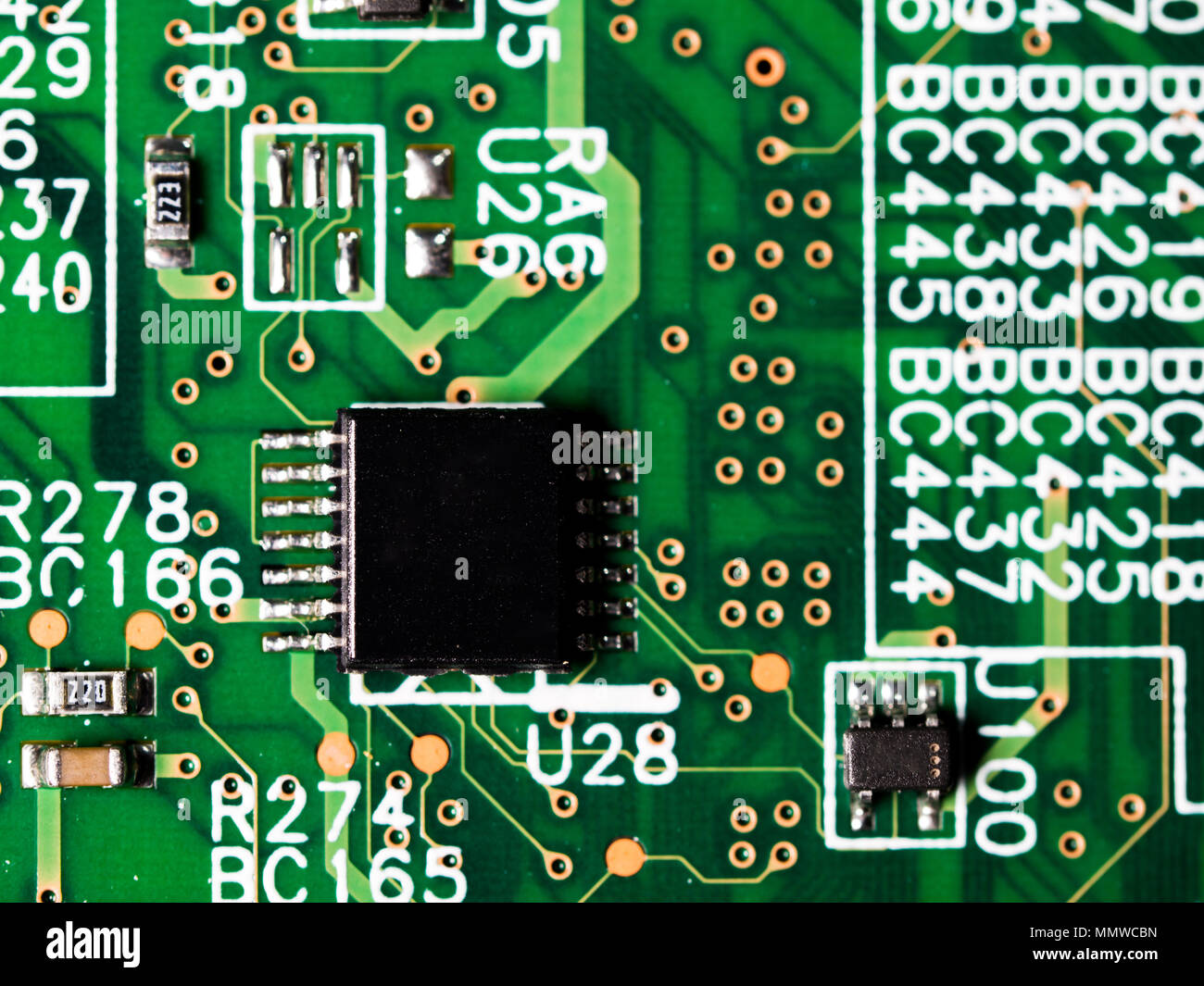 closeup of circuit board with integrated circuits, resistors and capacitors Stock Photo Alamy