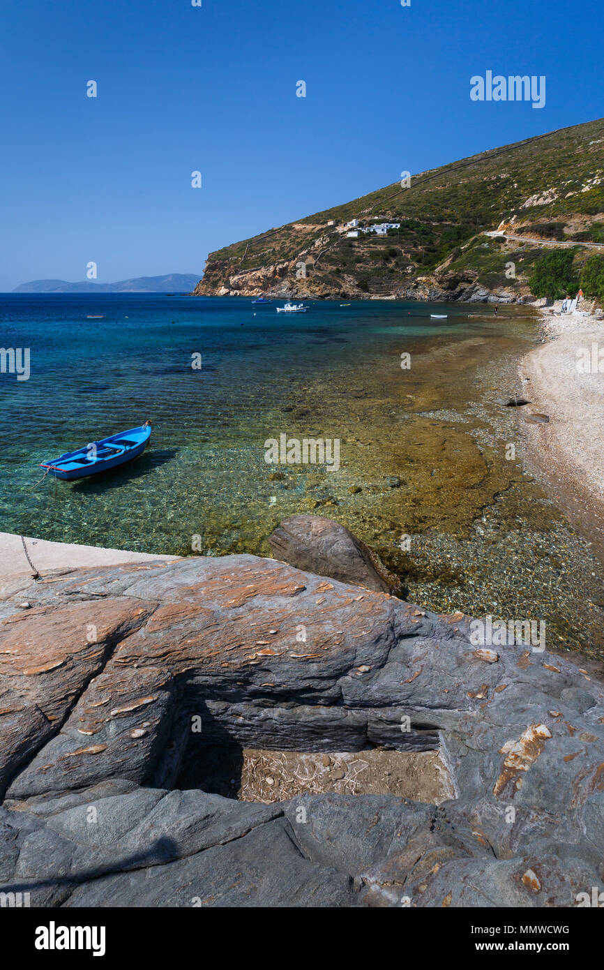 Kamari village and beach with one of the last visible remains of ancient settlement on Fourni island, Greece. Stock Photo