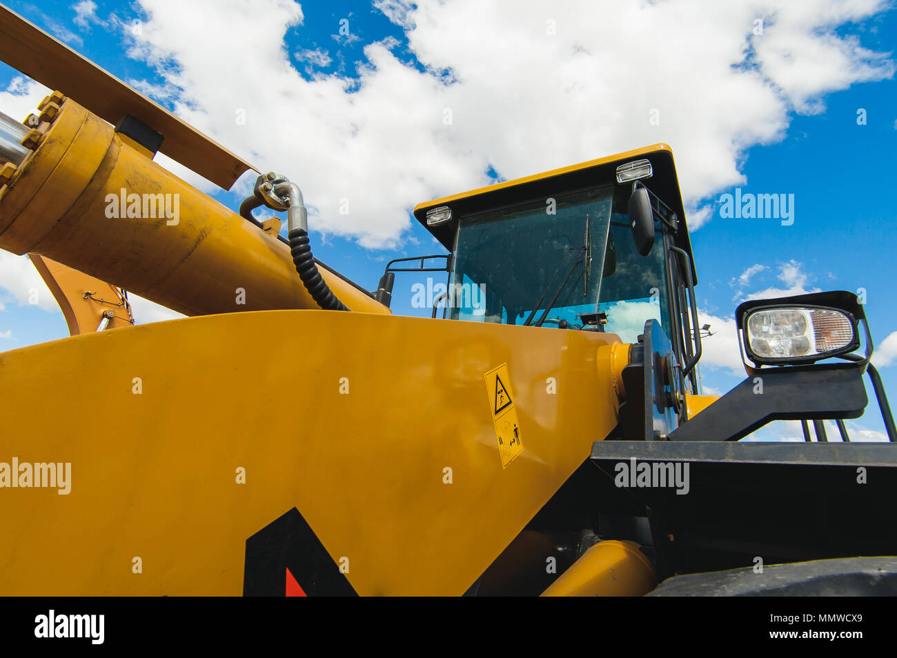 Excavator Loader Machine. Side View of Front Hoe Loader. Industrial