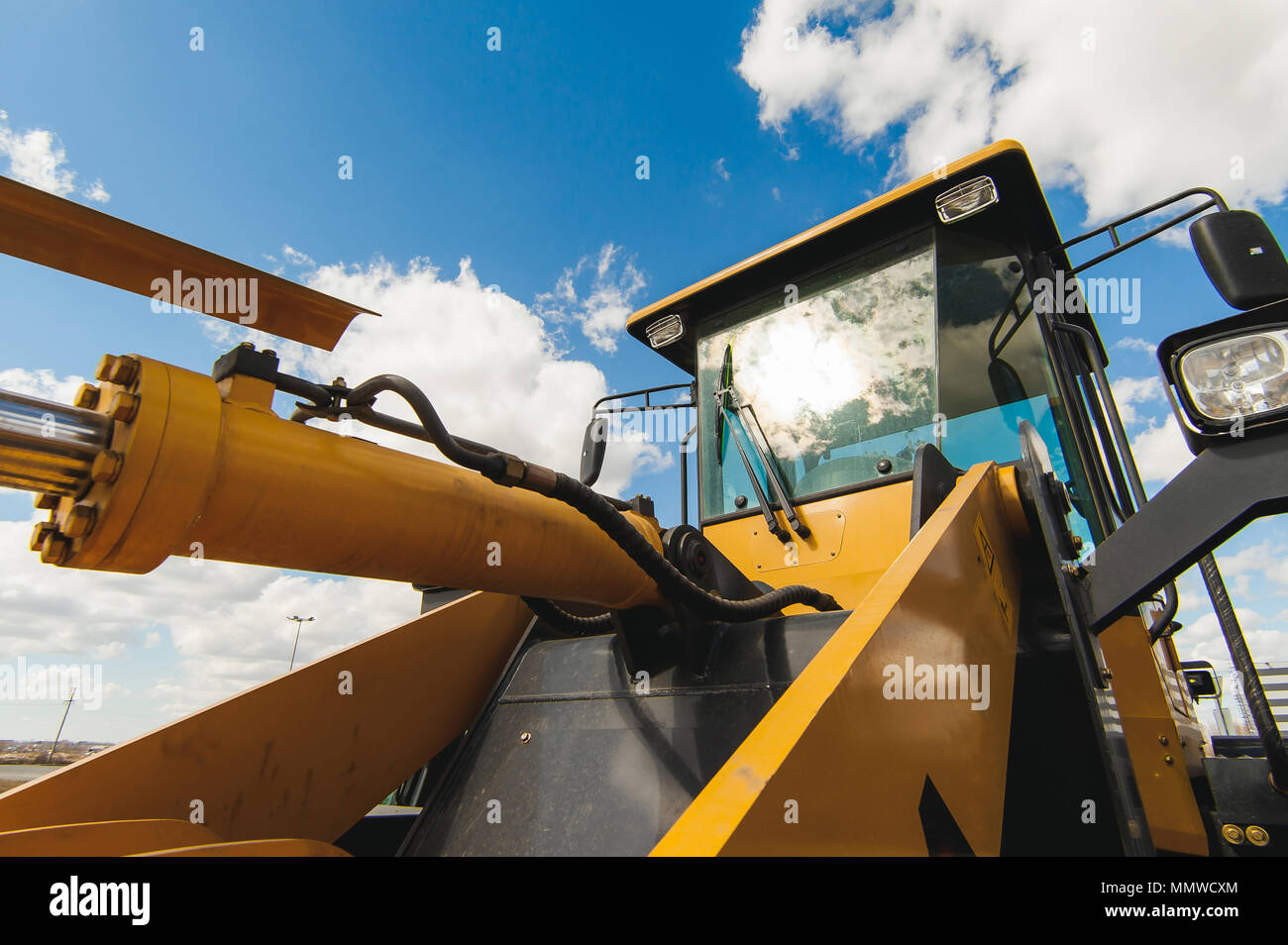 Excavator Loader Machine. Side View of Front Hoe Loader. Industrial