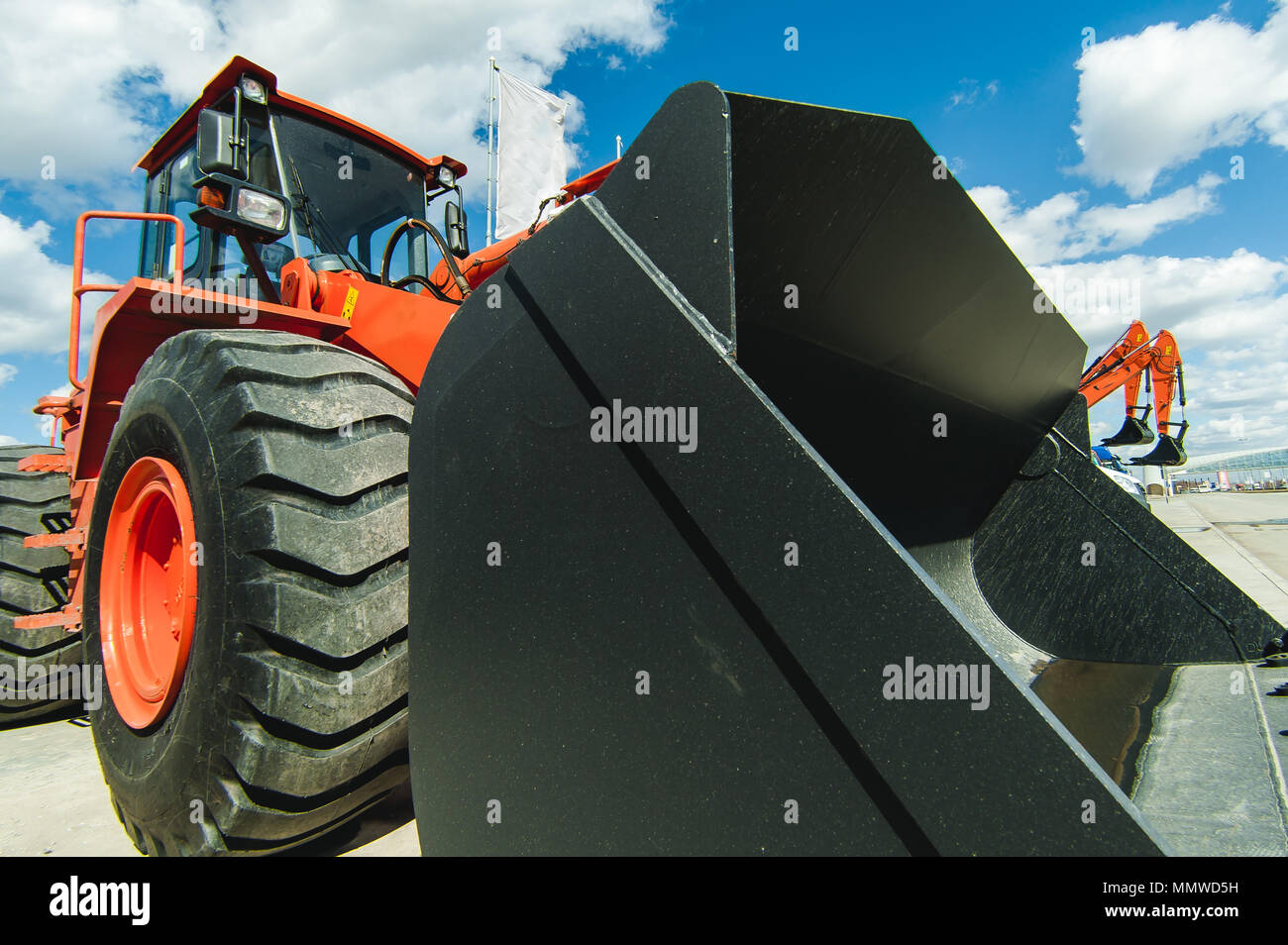 Excavator Loader Machine. Side View of Front Hoe Loader. Industrial