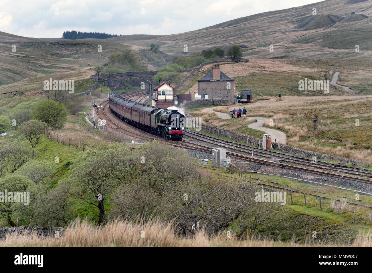 Steam locomotive British India Line passes Blea Moor signal box on the Settle-Carlisle railway line with a 'Dalesman' special train, North Yorkshire,. Stock Photo