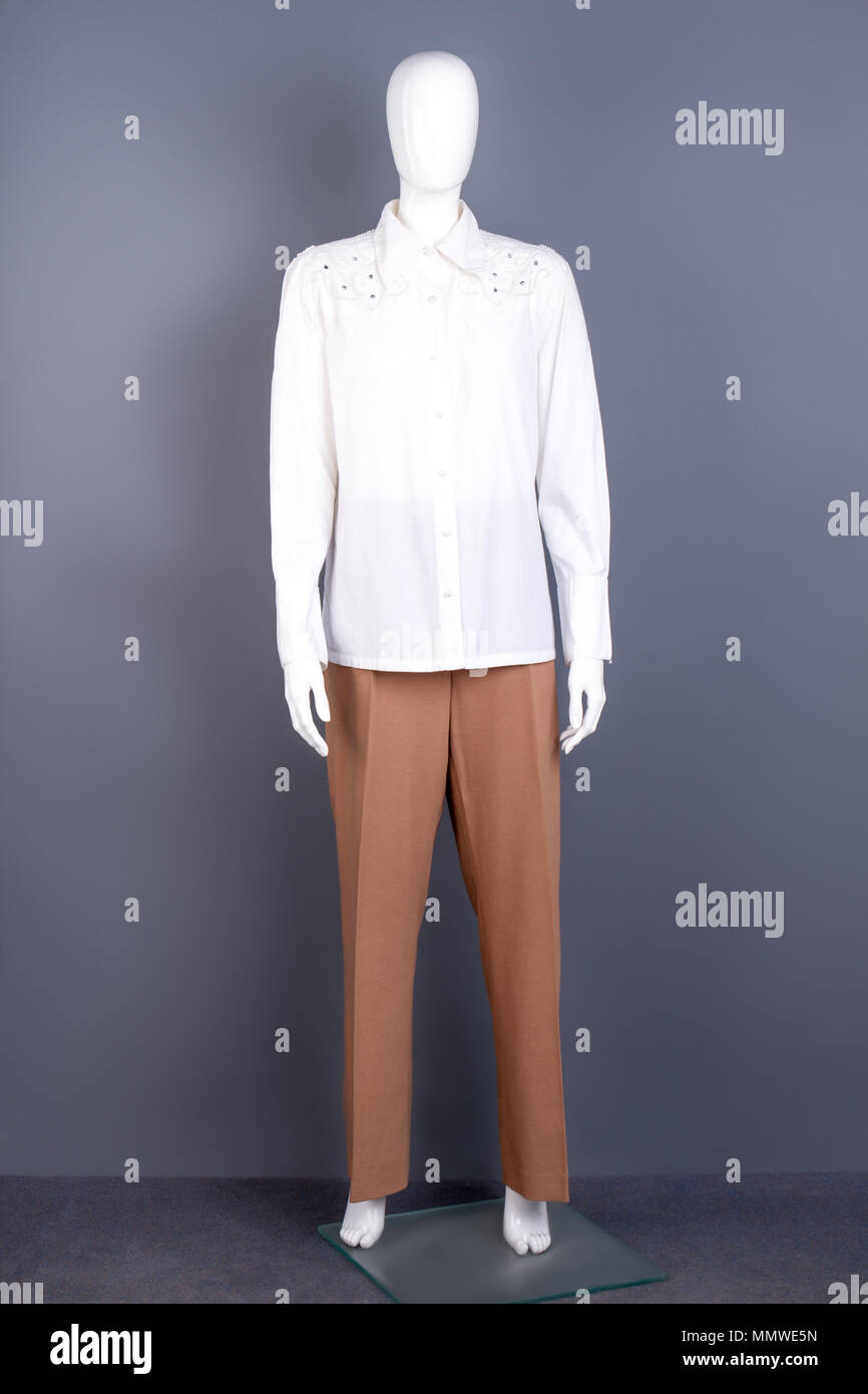 Mannequin wearing female shirt and trousers Stock Photo Alamy