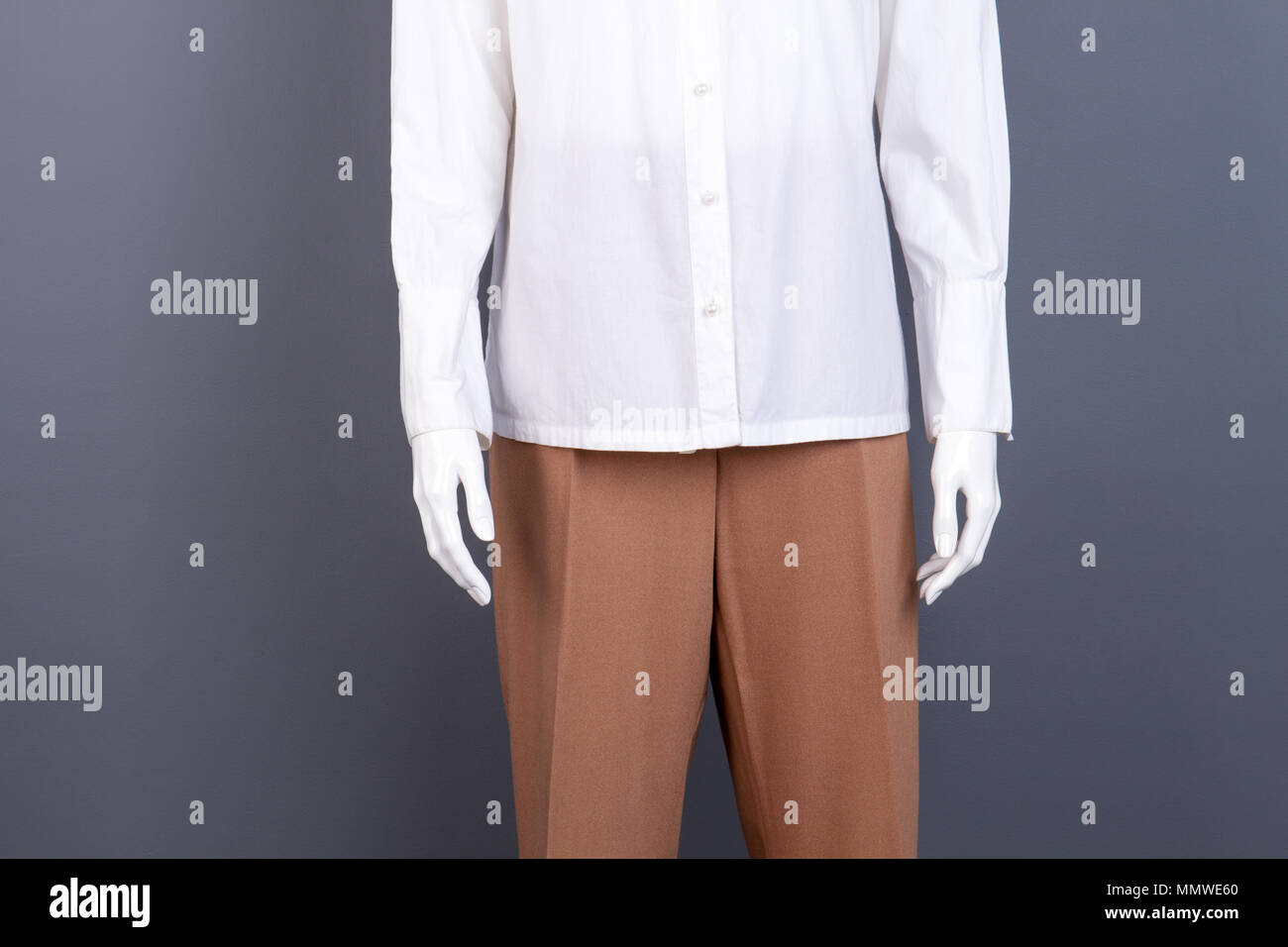 Mannequin dressed in female shirt and trousers Stock Photo Alamy