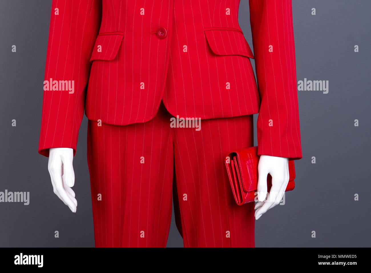 Formal style red suit and wallet. Stock Photo
