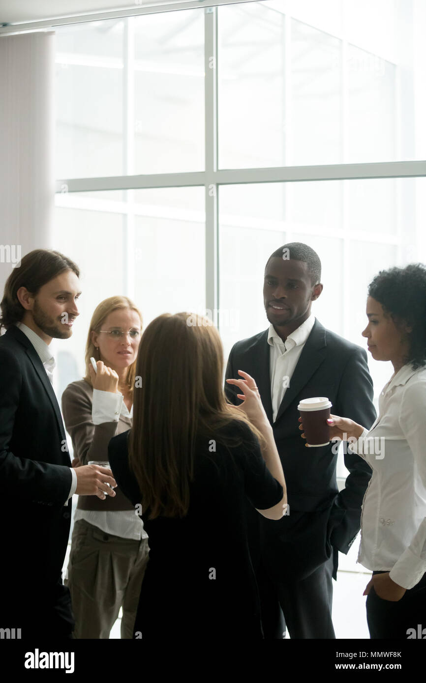 Executive business team having discussion at coffee break in off Stock Photo