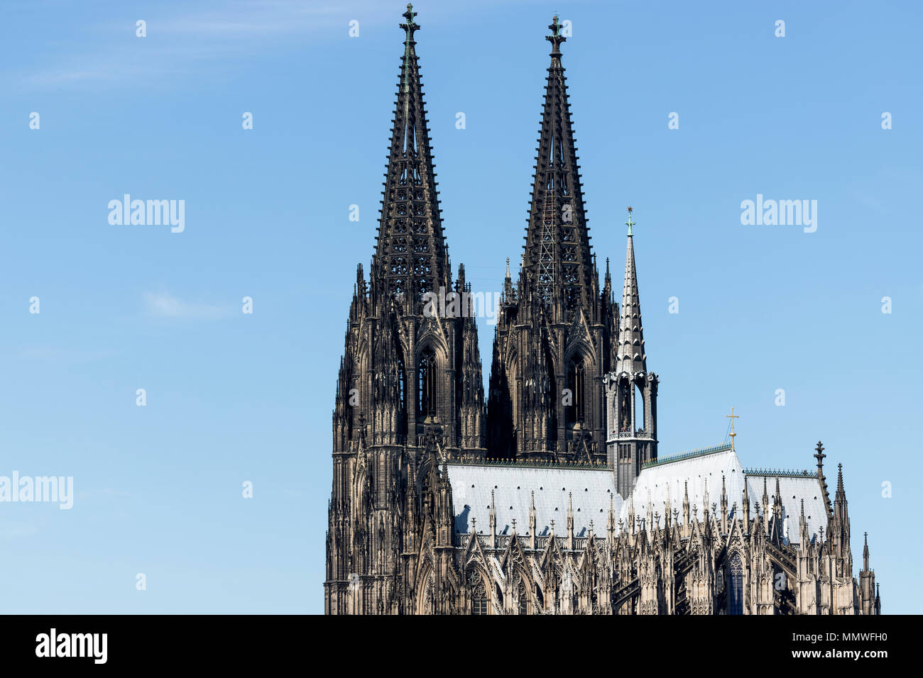 Cologne Cathedral. It is Germany's most visited landmark, attracting an average of 20,000 people a day and currently the tallest twin-spired church. Stock Photo