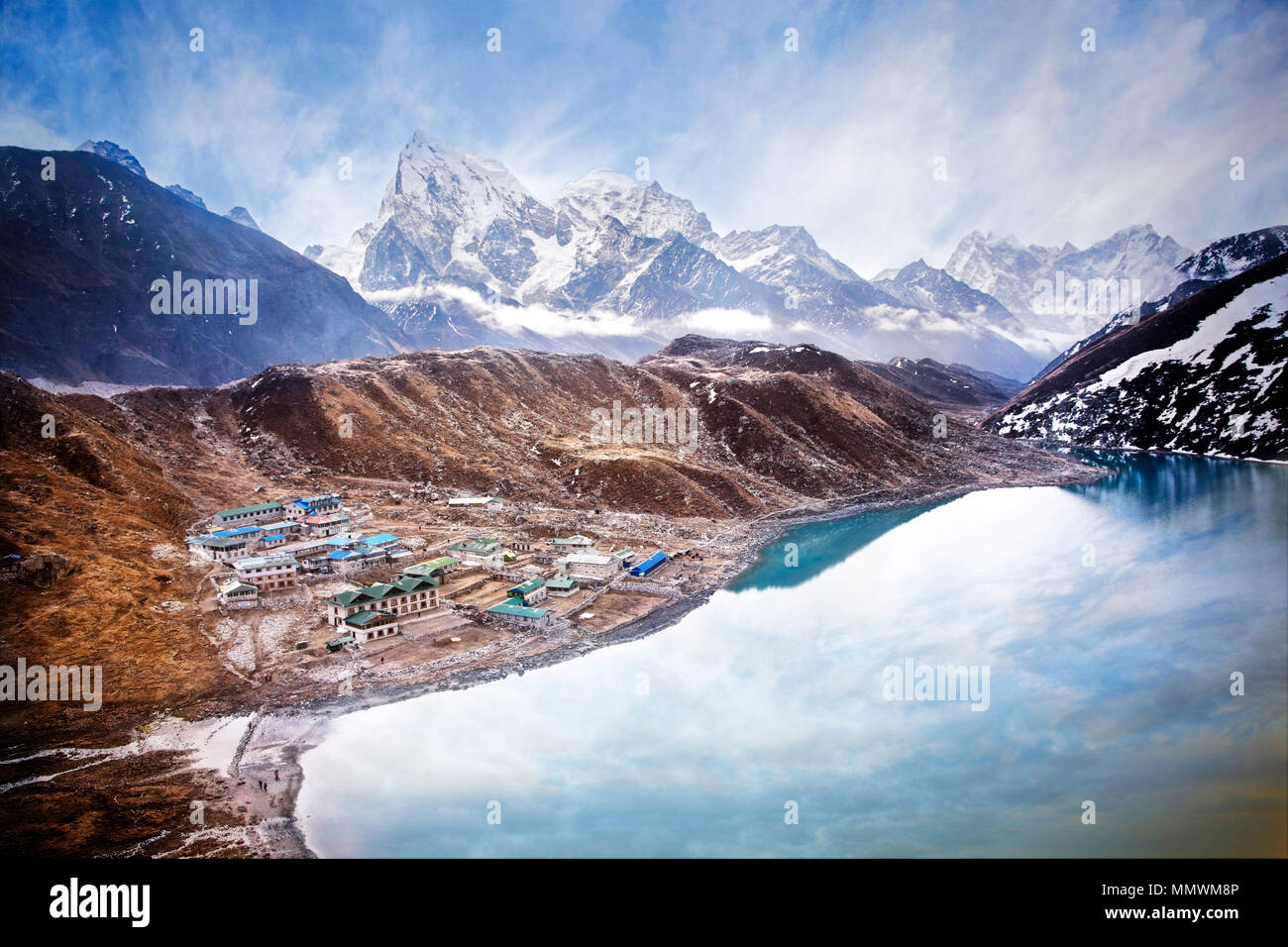 Gokyo and Goyko Lake at over 15,000 feet with Cholatse (6335 meters) and  Tabuche (6367 meters) in the background. Sagarmatha National Park, Nepal  Stock Photo - Alamy