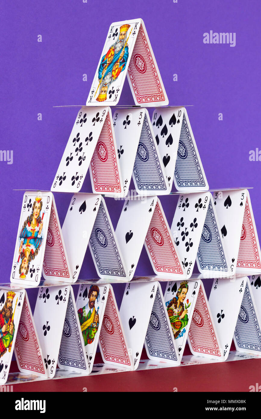 A house of cards - a metaphor for a complicated organisation or plan that can easily go wrong Stock Photo